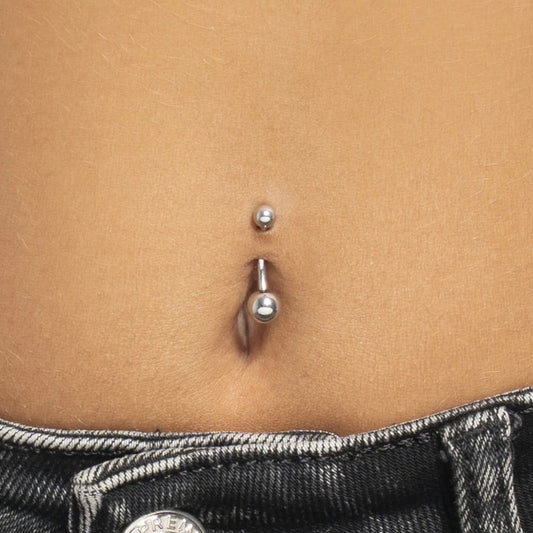 Piercing ombelico Luca Barra